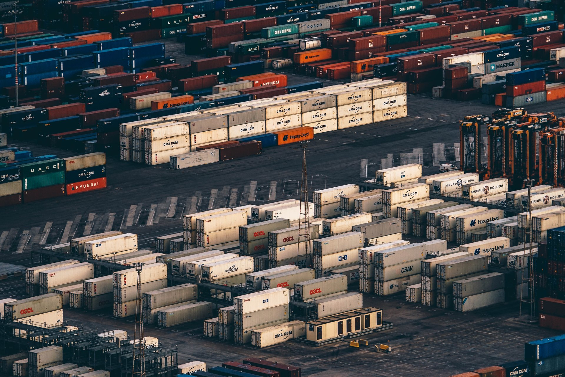 Shipping containers arranged at a commercial port